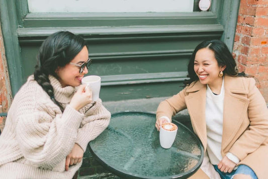 Two women enjoying a coffee together